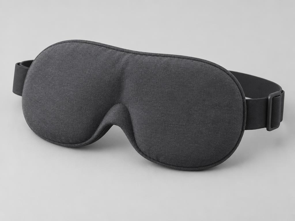 Charcoal cotton weighted sleep mask with contoured nose bridge and adjustable strap